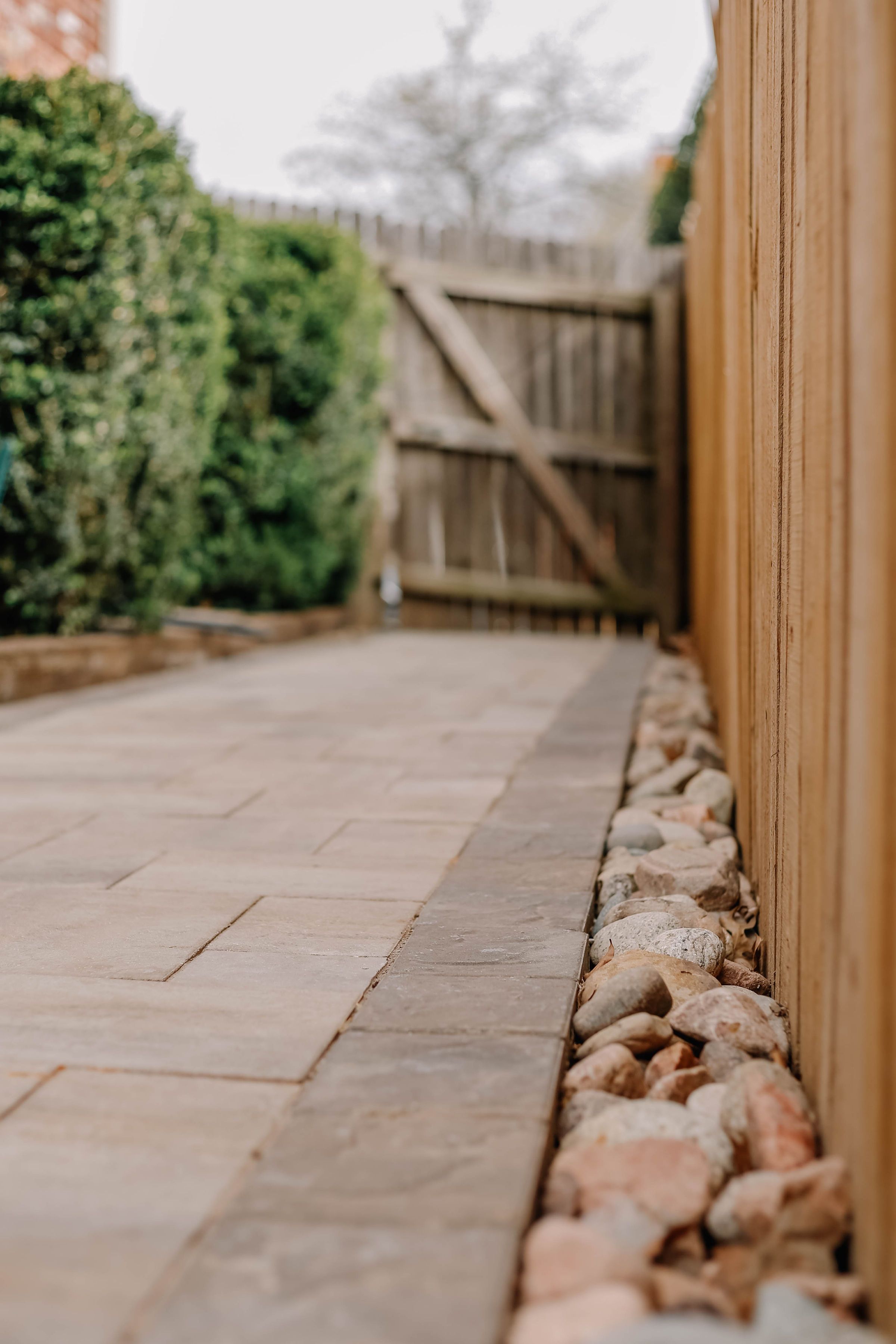 Stone path and timber fencing