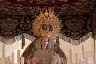 Intricate religious statue adorned with a gilded crown, displayed in El Puerto de Santa María.