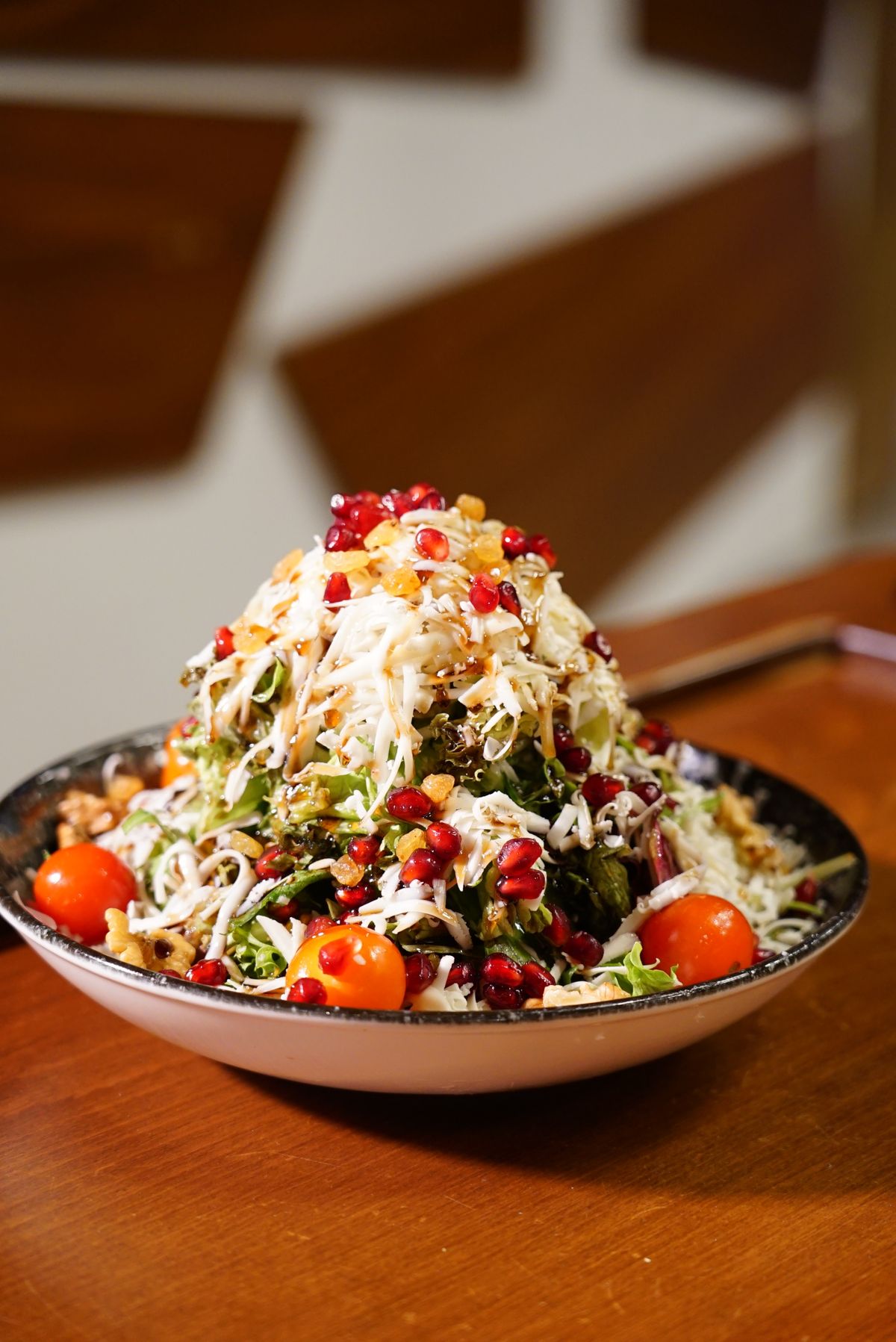 Colorful salad with pomegranate and nuts for the Thanksgiving table