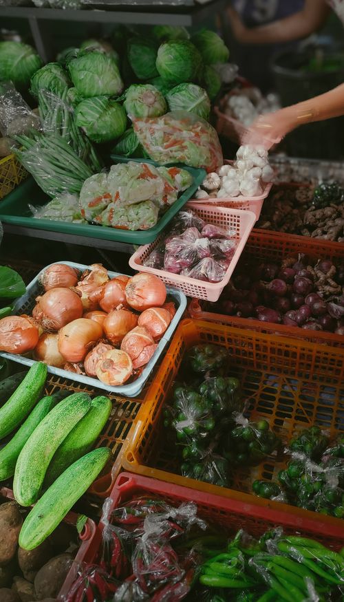 Free A vibrant display of fresh vegetables at a local market in the Philippines, showcasing a variety of produce. Stock Photo