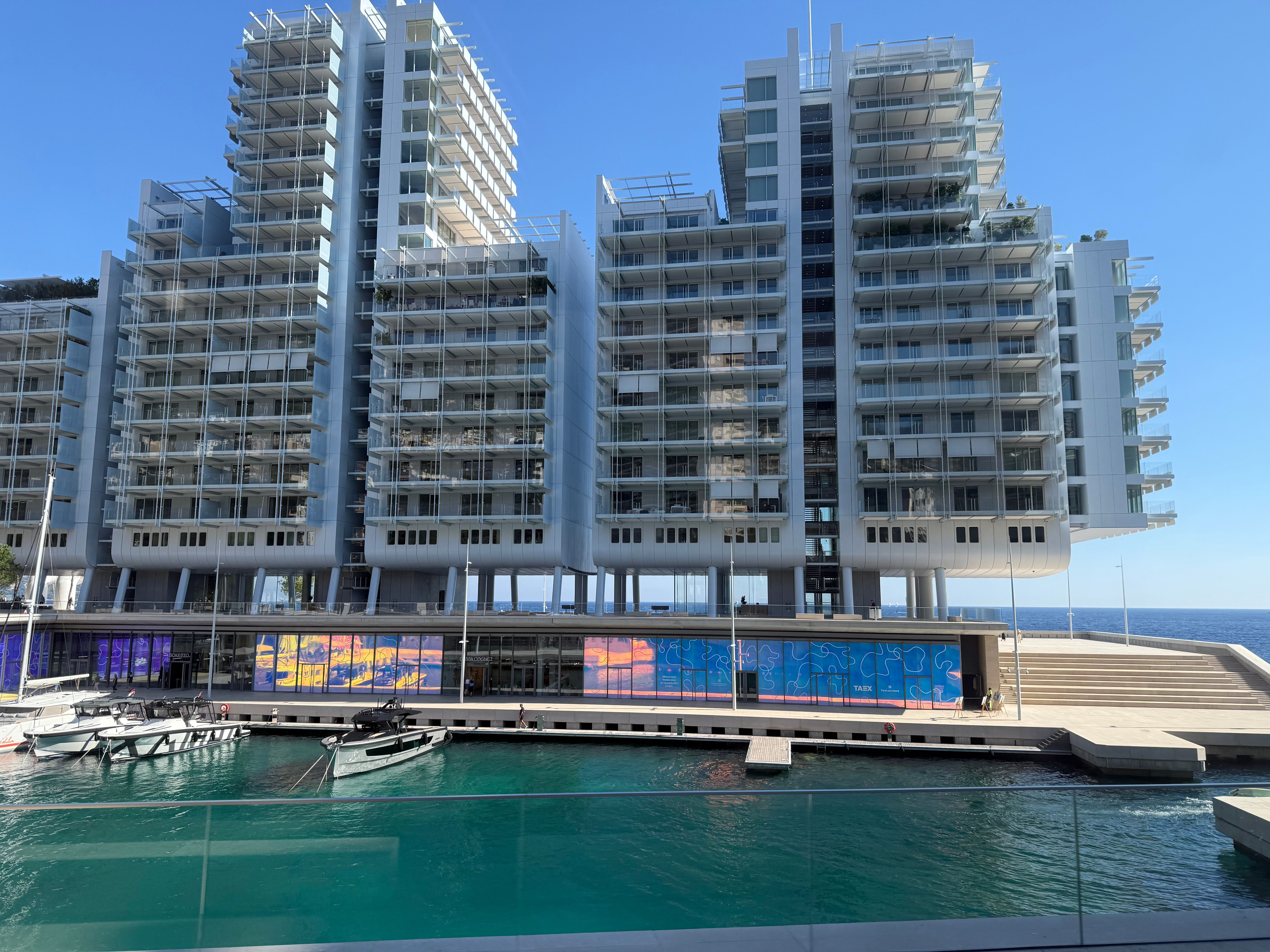 Modern waterfront high-rise architecture view · Free Stock Photo