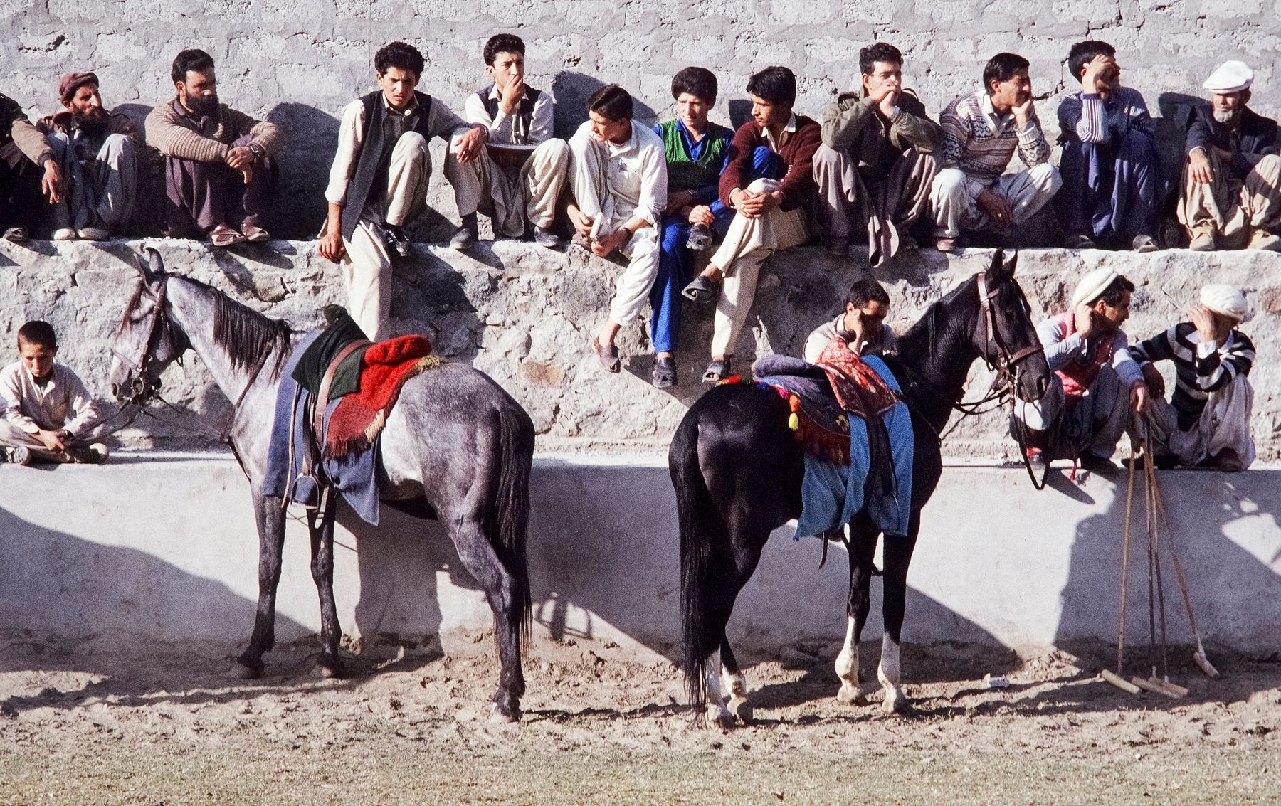 Captivating image of a traditional horse polo event with spectators in Pakistan.