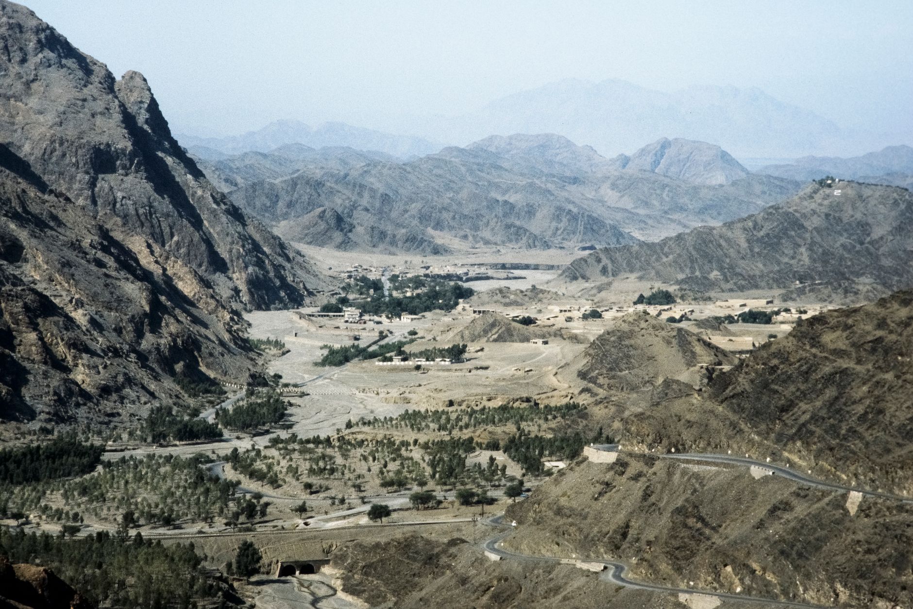 A stunning aerial view of the rocky mountains and valleys in Pakistan.