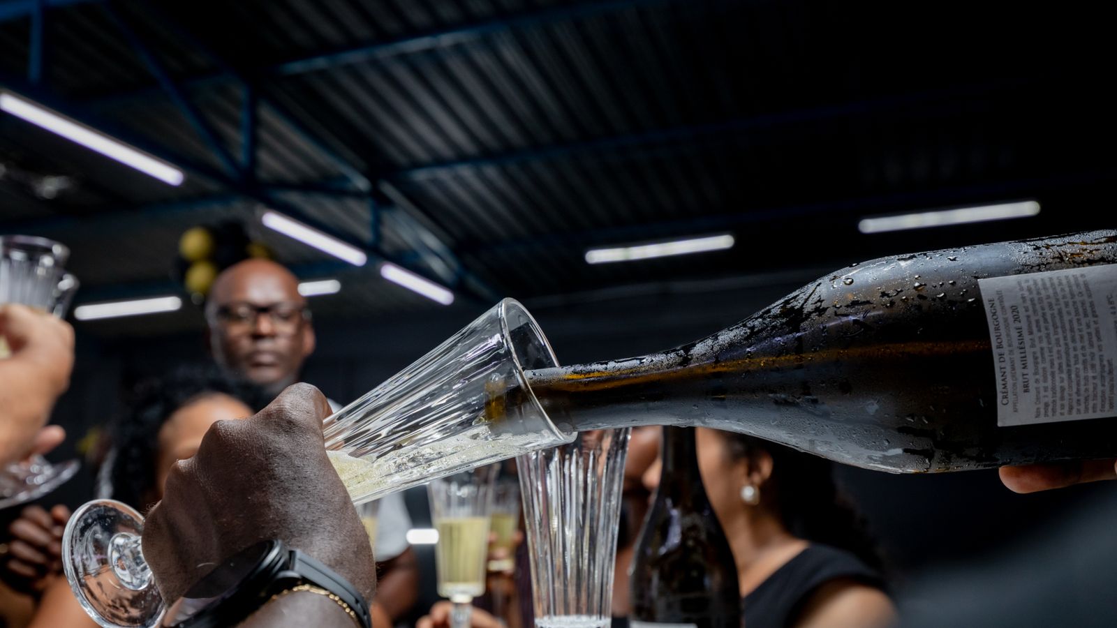 Celebratory toast with champagne in luanda, Angola