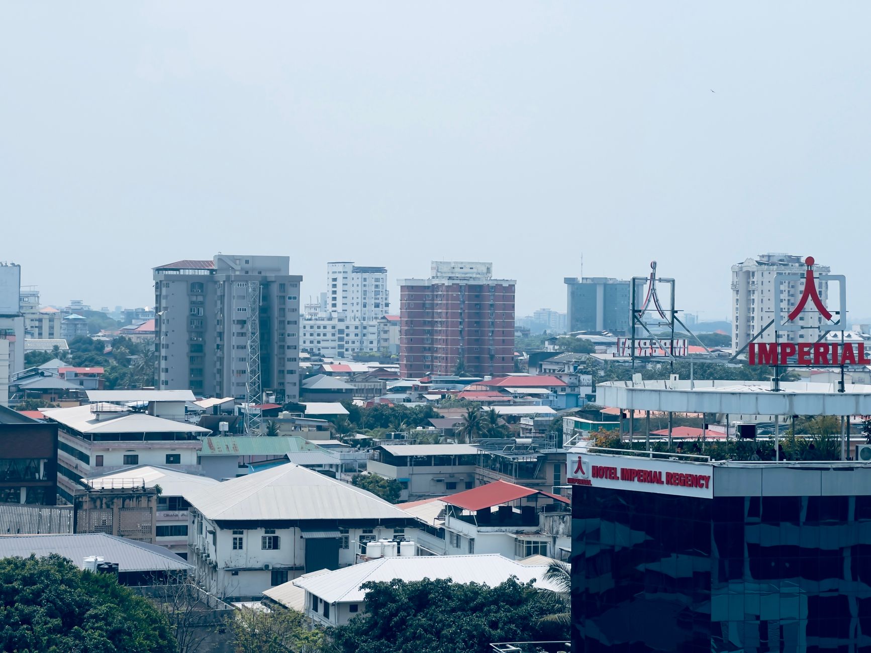 City view featuring the Imperial Regency Hotel and surrounding buildings under a clear sky. Related image for Market Trends: What Comes Next for Modern Properties.