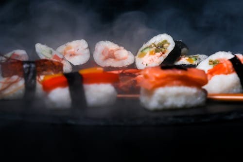 Sushi on Black Round Plate