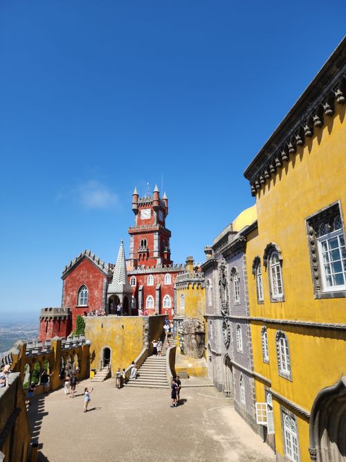 Free Vibrant view of Palácio da Pena, a stunning 19th-century castle in Sintra, Portugal. Stock Photo