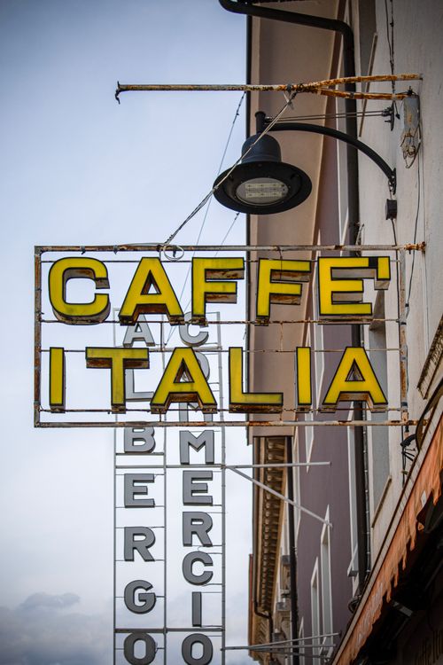Free Classic Caffè Italia sign in Palmanova, showcasing Italian charm and style. Stock Photo