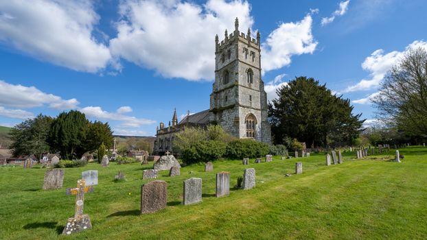 Historic St Andrew's Church in Fontmell Magna, with its ancient graveyard and Gothic architecture.