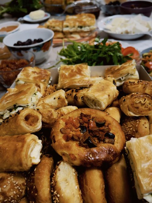 Free A close-up of diverse pastries and appetizers on a buffet table, perfect for catering promotions. Stock Photo