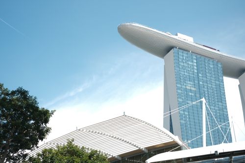 Free Capture of Marina Bay Sands and ArtScience Museum against a clear blue sky in Singapore. Stock Photo