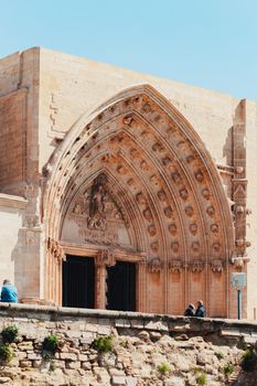 Stunning view of the Gothic facade of Lleida Cathedral, a historical monument in Catalonia, Spain.
