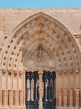 Stunning Gothic-style entrance of a historic church in Lleida, Catalonia, showcasing intricate architectural details.
