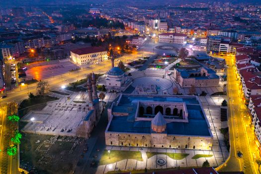 Stunning aerial photograph of Sivas city center illuminated at night, showcasing historic architecture.