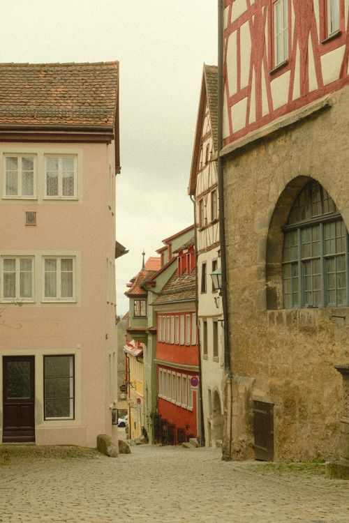 Free Picturesque street in Rothenburg ob der Tauber showcasing traditional Bavarian architecture. Stock Photo