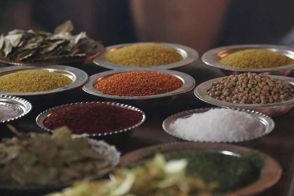 Metal prep bowls of spices, grains and salt lined up on a bench — Muhammed Salih Karabağ on Pexels