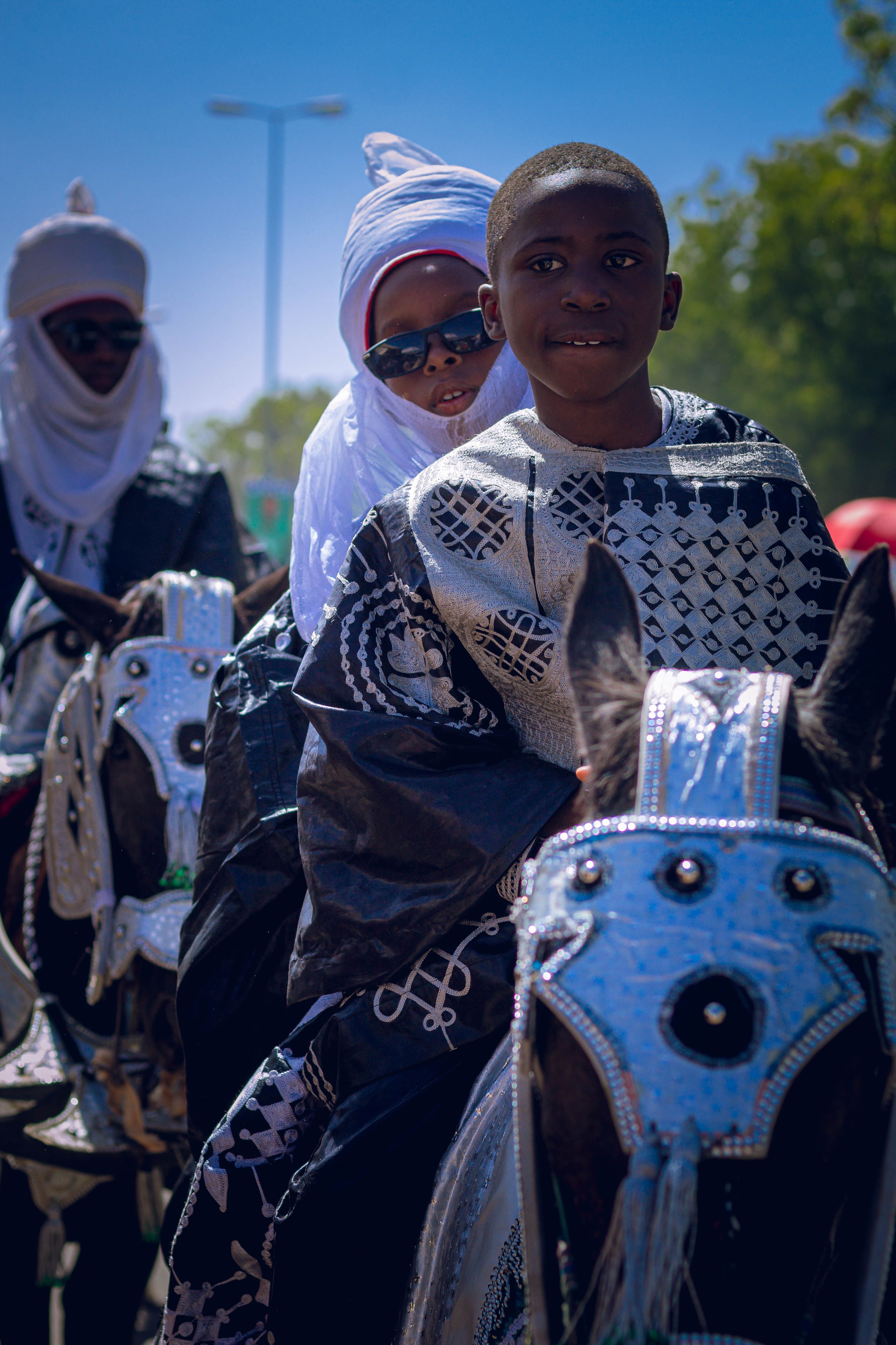 Traditional African Horse Riders in Cultural Attire · Free Stock Photo