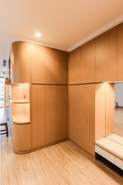 Built-in birch joinery in a small room — photo by DOAN THANH BINH on Pexels