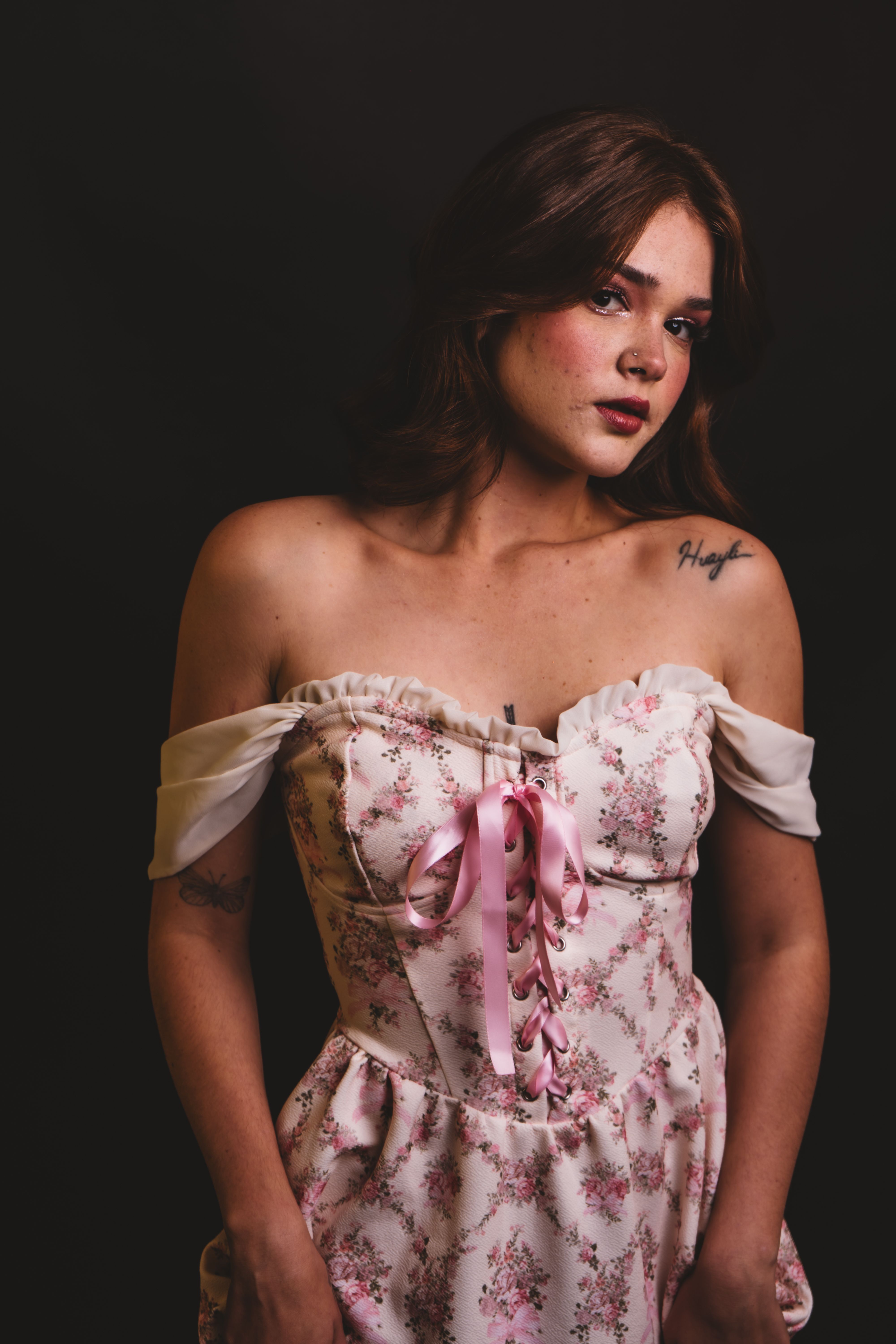 Elegant Portrait of Woman in Floral Dress · Free Stock Photo