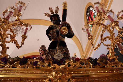 Intricate religious statues in Semana Santa procession, San Fernando, Spain.