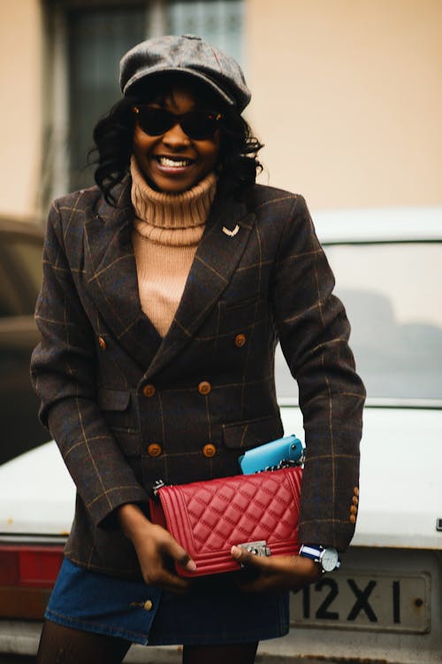 Photo Of Woman Carrying Pink Bag