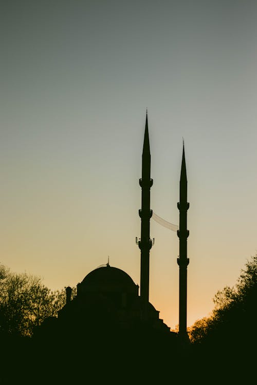 Free Silhouette of mosque against evening sky Stock Photo