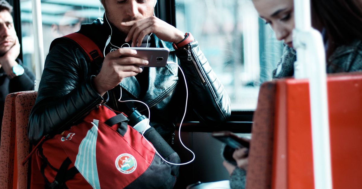 Using Cellular Phone People Using Cellular Phone · Free Stock Photo
