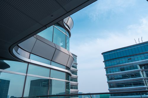Free Stunning view of modern architecture against a clear blue sky in Hangzhou, China. Stock Photo