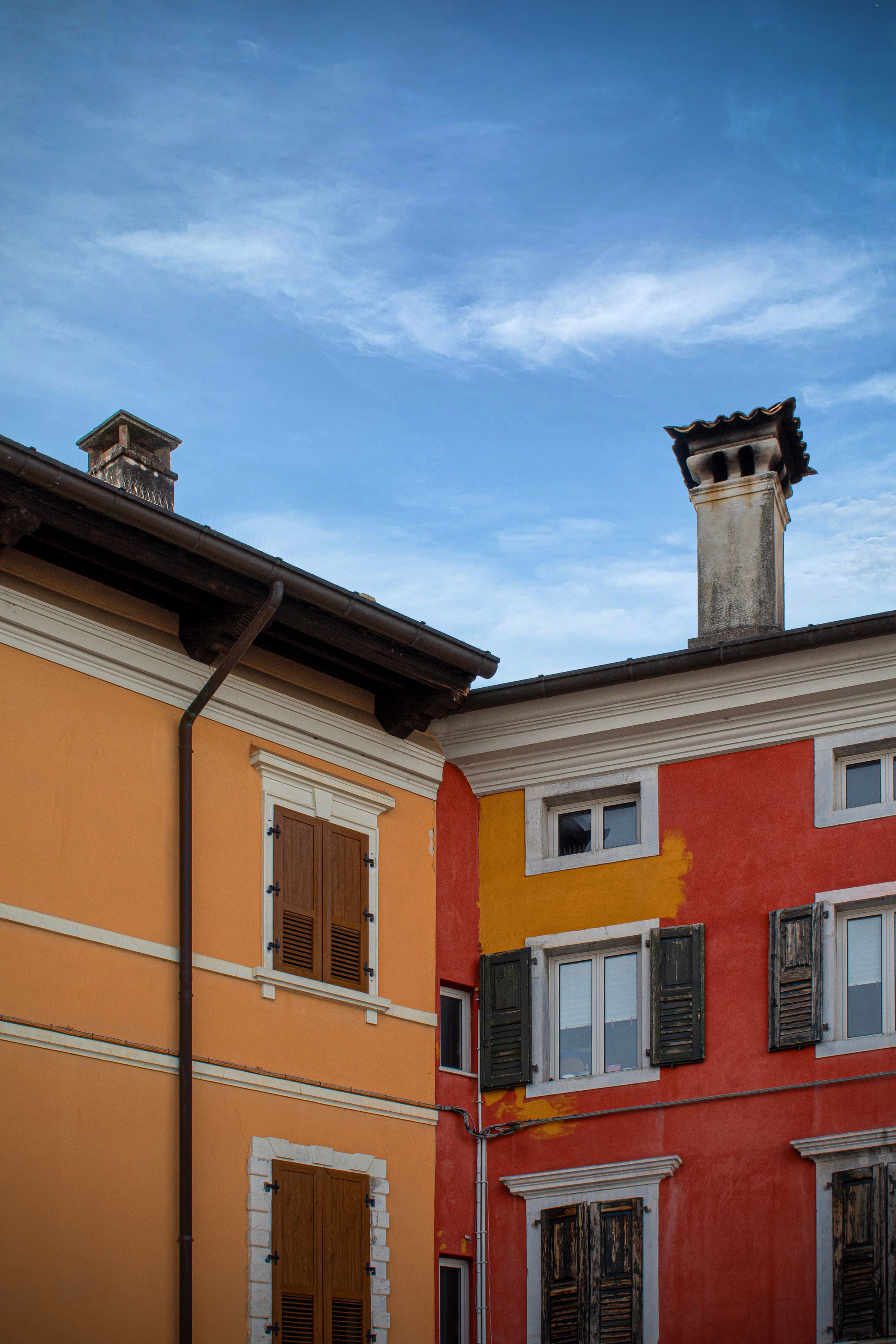 Vibrant historic buildings in Palmanova's picturesque town square.