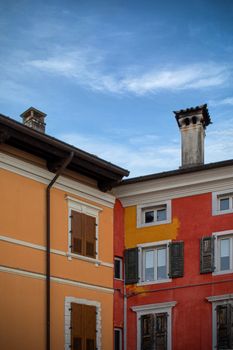 Vibrant historic buildings in Palmanova's picturesque town square.