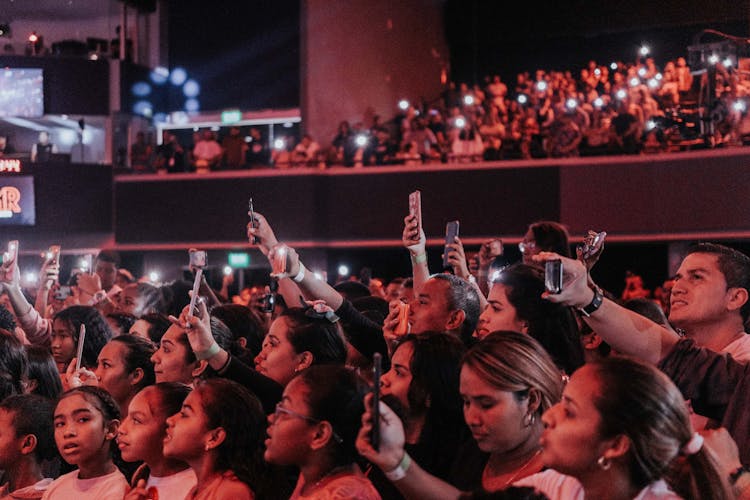 Photo Of People Using Their Phones