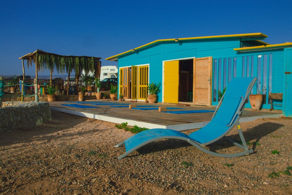 Colorful beach house in Taghazout, Morocco, perfect for relaxation and leisure.