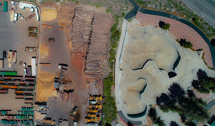 Aerial View On Wood Processing Plant And Skate Park