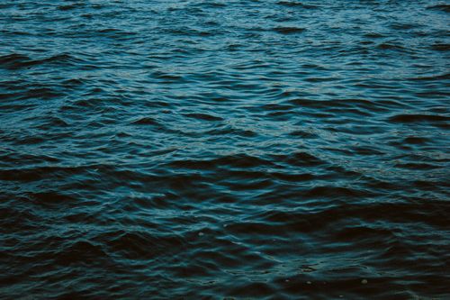 Free A serene view of gentle waves on the Bosphorus Strait in Istanbul, Türkiye. Stock Photo