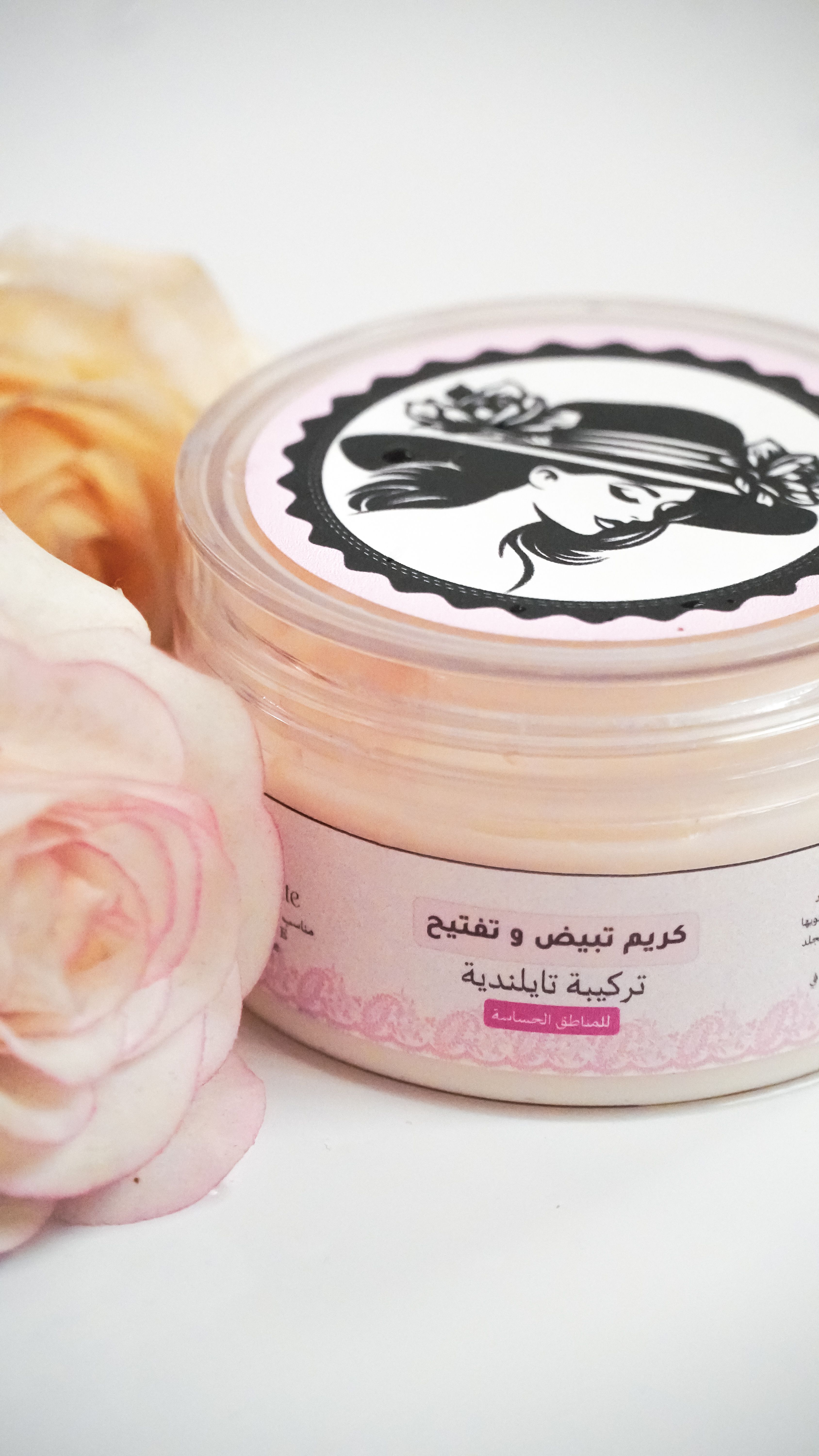 Aesthetic skincare cream jar adorned with stylish floral design and elegant label.