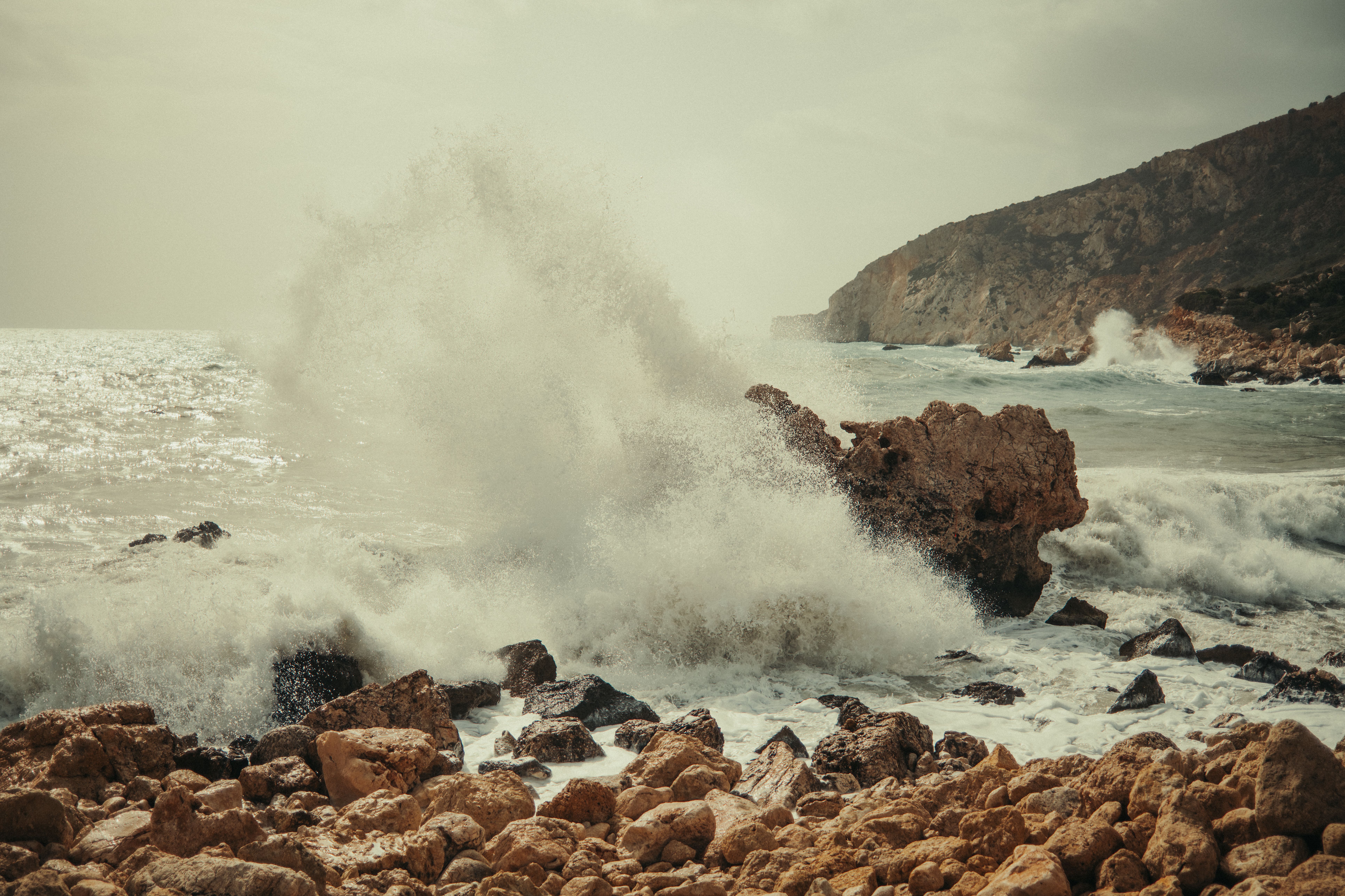 Dramatic Ocean Waves Crashing Against Rocky Shore · Free Stock Photo