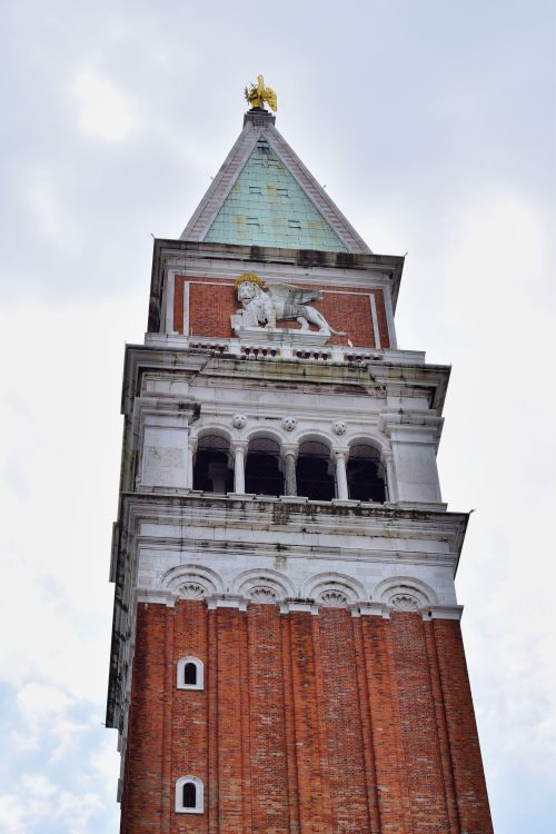 Free A striking view of the famous San Marco Campanile against the sky in Venice, Italy. Stock Photo