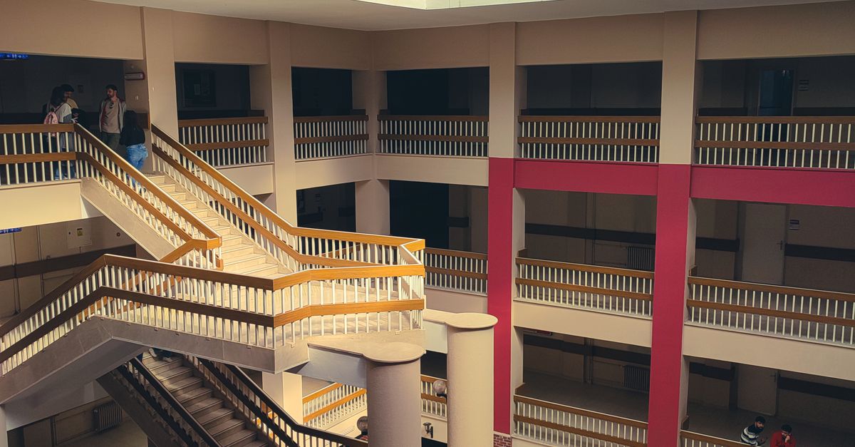 Atrium Ranch Curved Stairs Modern Atrium with Spiral Staircases · Free Stock Photo