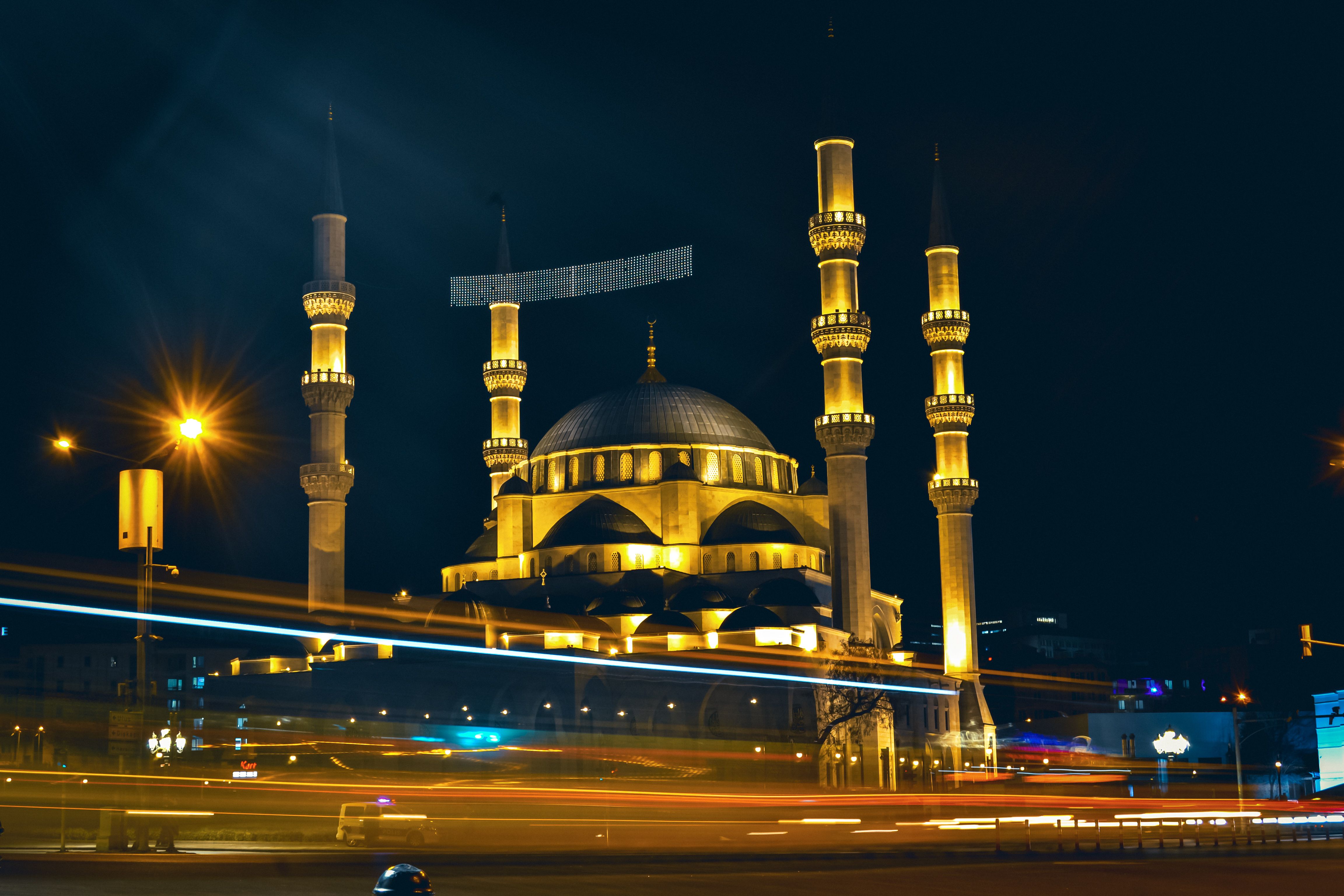 Night View of Illuminated Mosque with Light Trails · Free Stock Photo