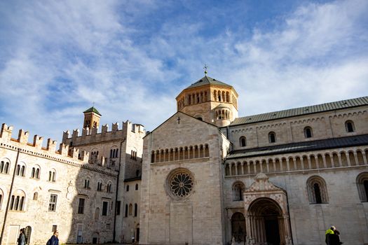 Panoramic view of the iconic Trento Cathedral under a clear blue sky.