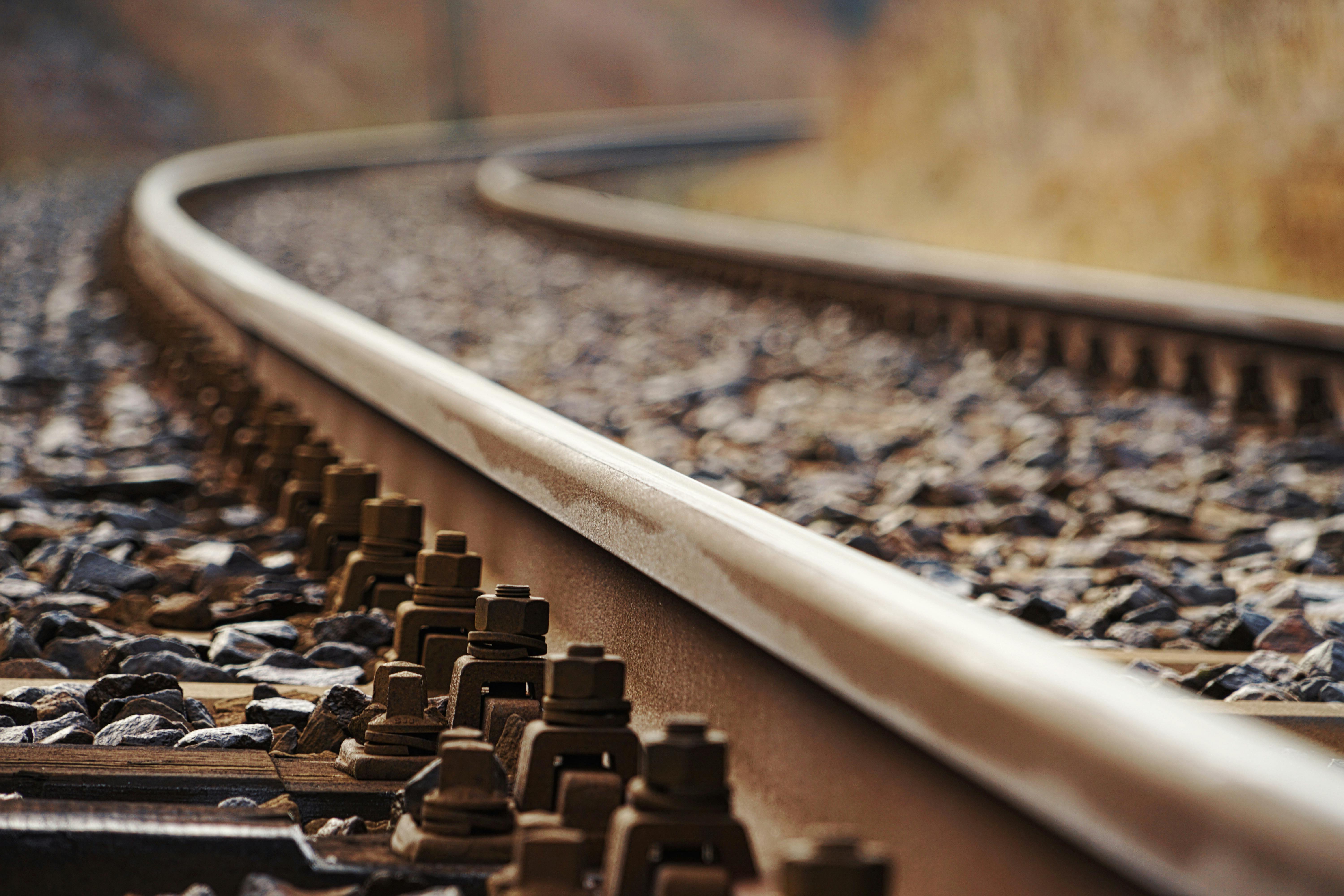 Shallow Focus Photography of Railway during Sunset · Free Stock Photo