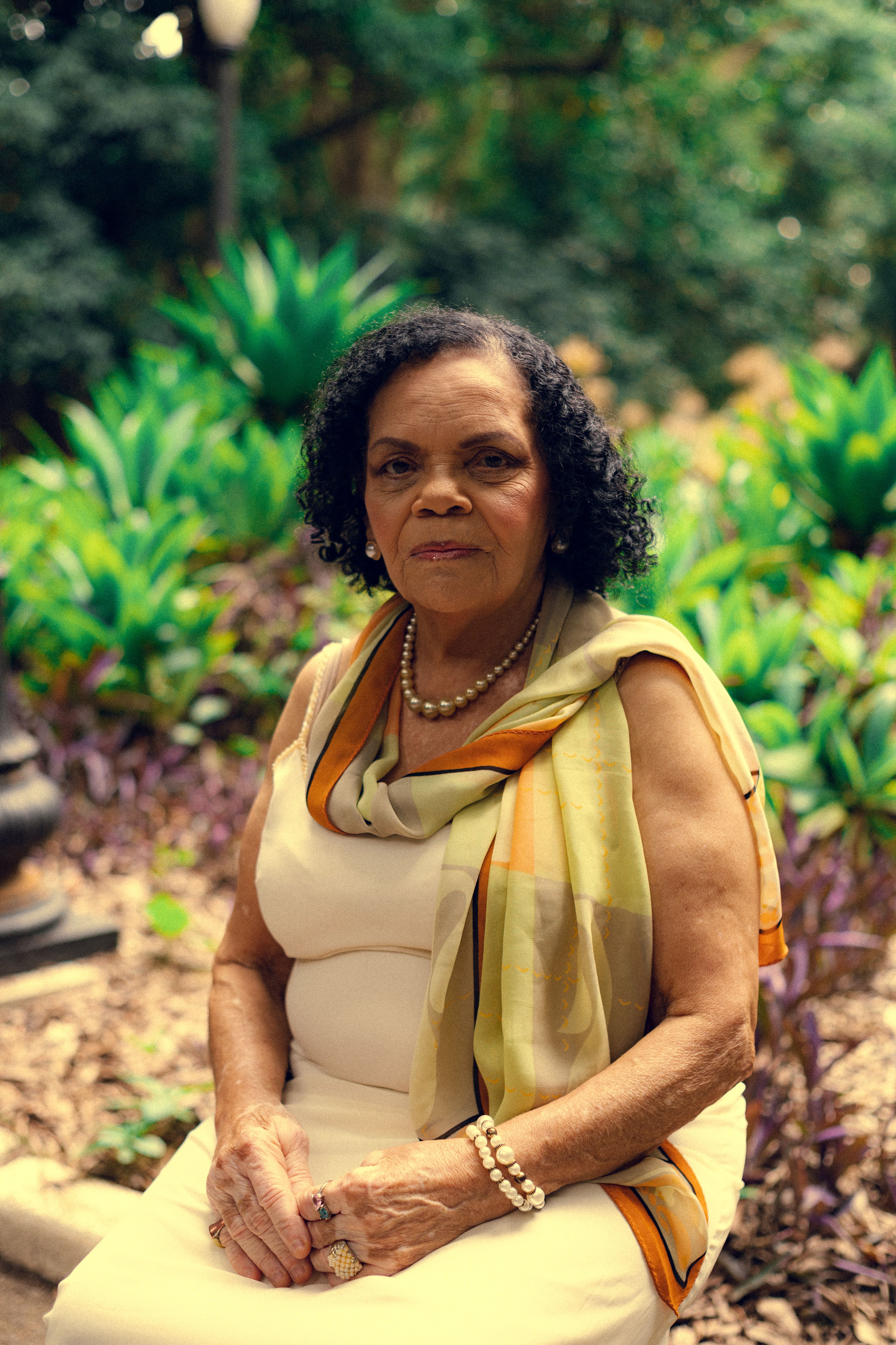 Portrait of a graceful senior woman in an outdoor setting in São Paulo, Brazil.
