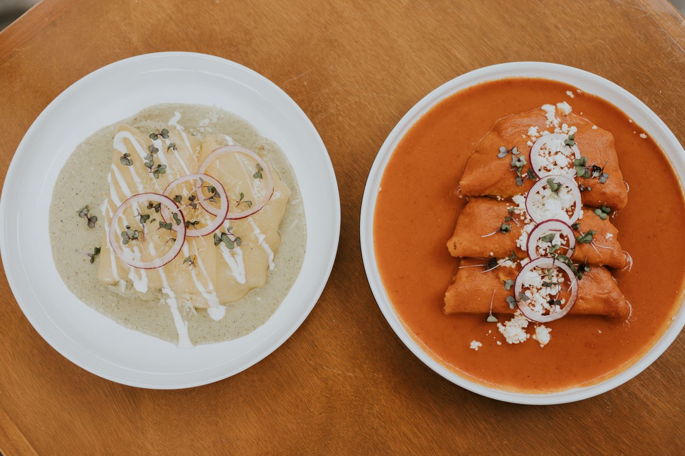 Enchiladas verdes and enchiladas rojas side by side, a red and green sauce wine pairing guide for Tex-Mex