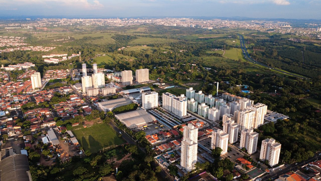 Stunning aerial view of the urban landscape of Hortolândia, Brazil, showcasing city planning and green expanses.