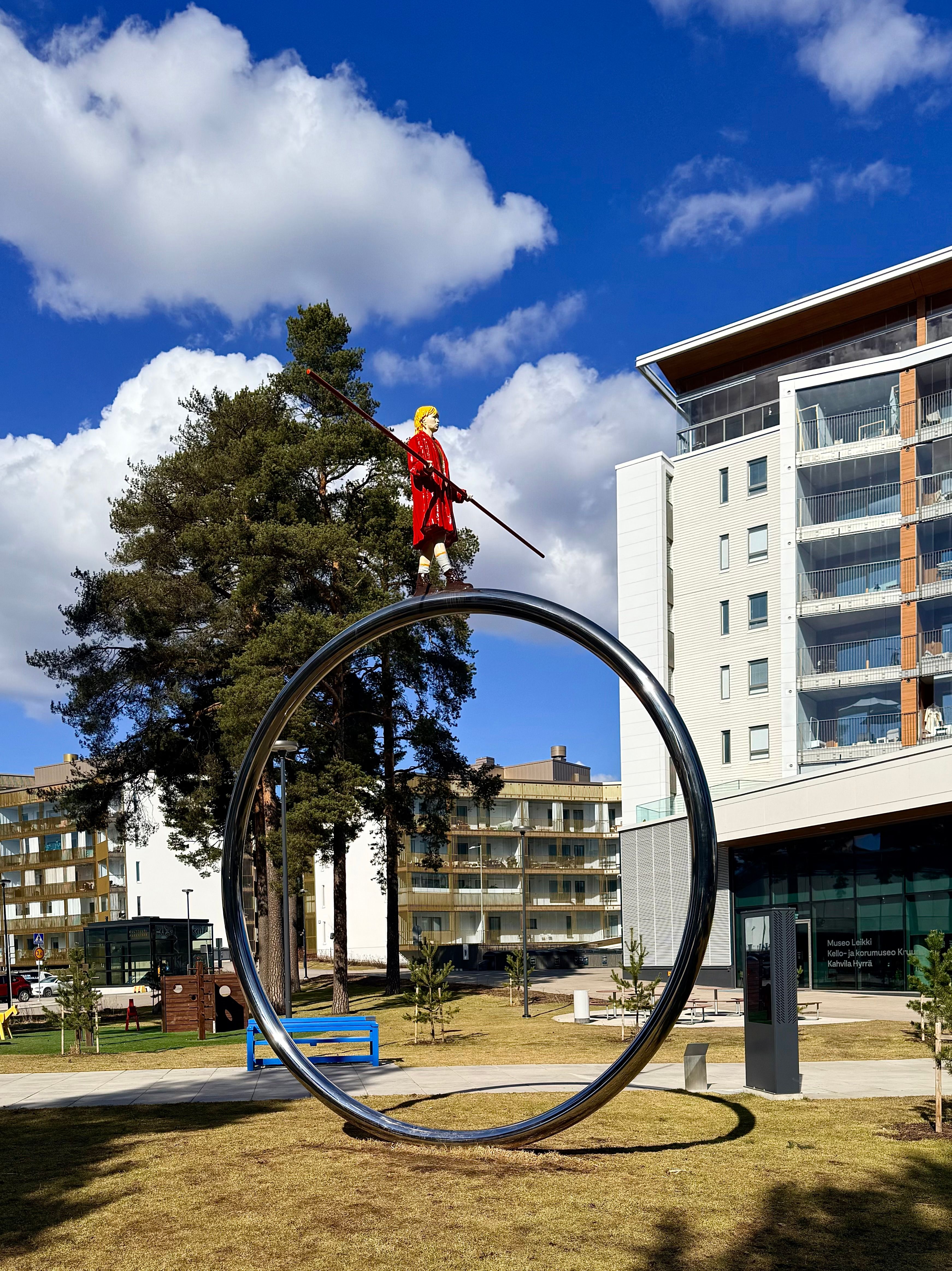A unique modern sculpture set in a vibrant urban park in Nuuksio, Finland, capturing artistic innovation.