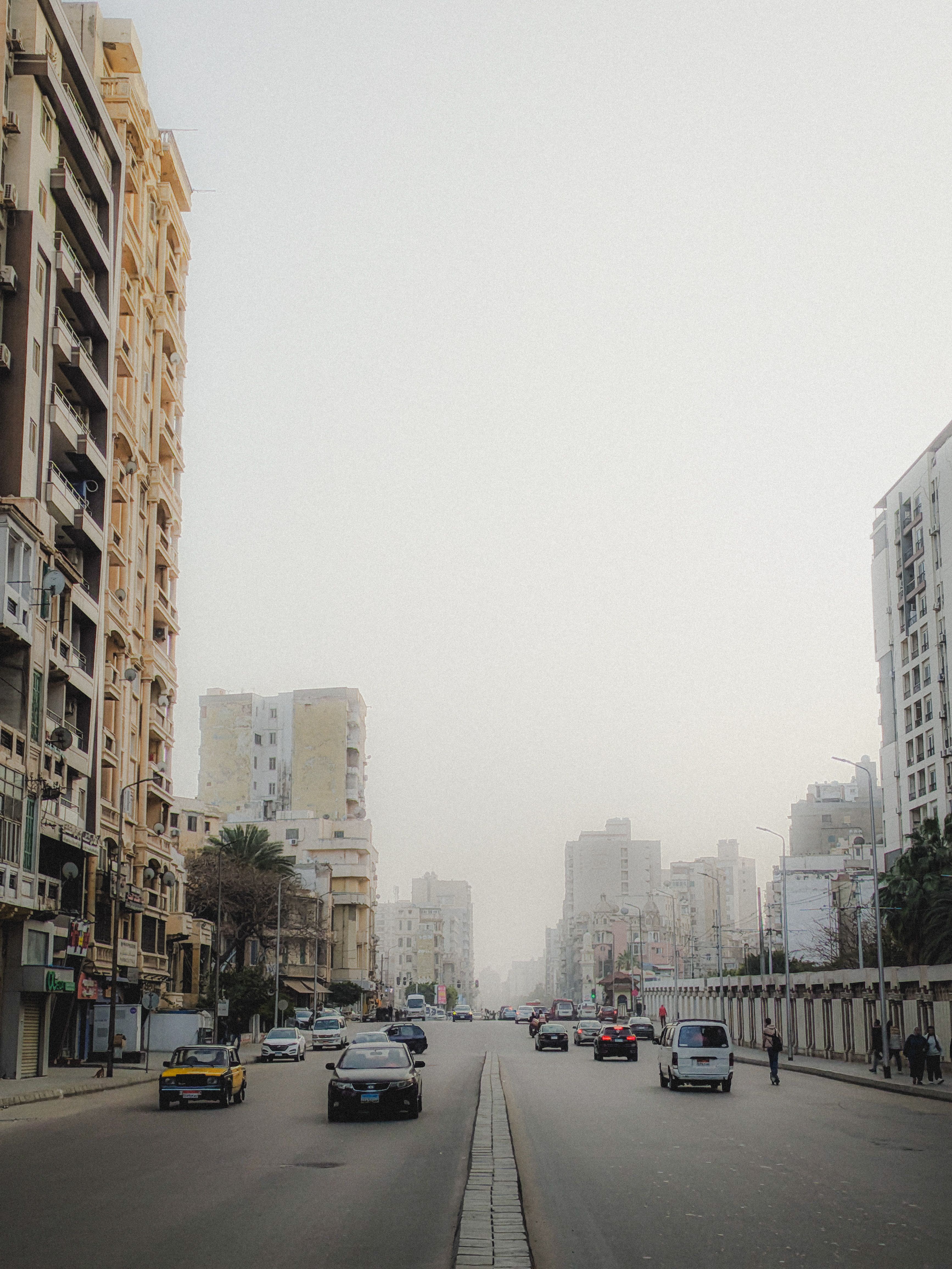 Urban street scene with traffic in a city · Free Stock Photo