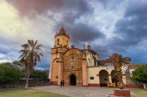 Free View of a historic mission with dramatic clouds in Concá, Querétaro, Mexico. Stock Photo