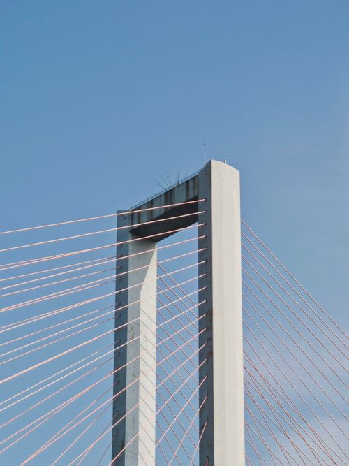 Free Close-up of Suramadu Bridge tower in Surabaya, East Java, Indonesia, under clear blue sky. Stock Photo