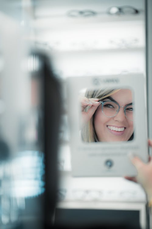 Woman Smiling Wearing Eyeglass