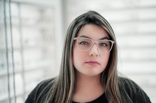 Portrait Photo Of Woman Wearing White Eyeglasses